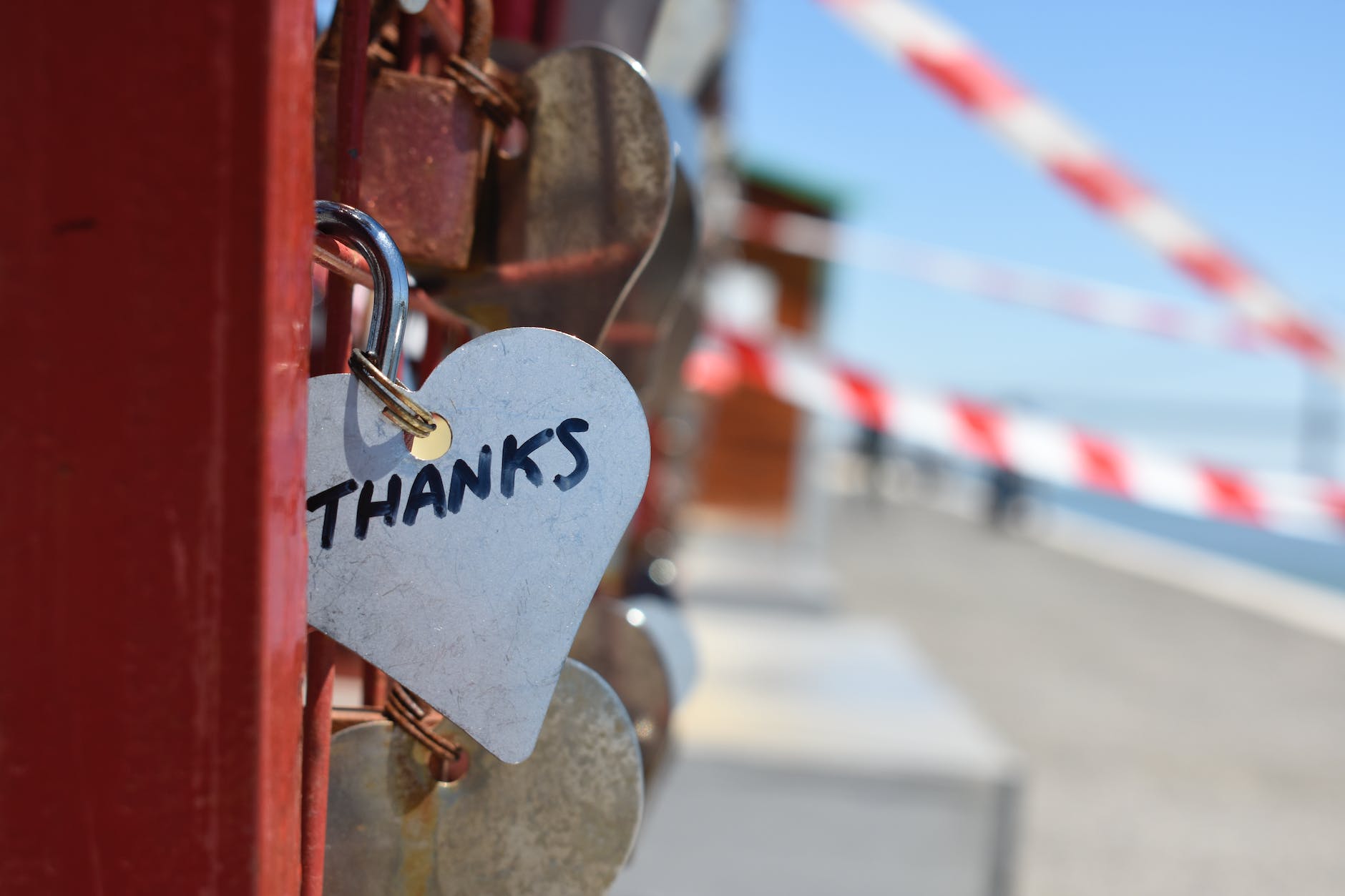 silver colored heart lock bridge